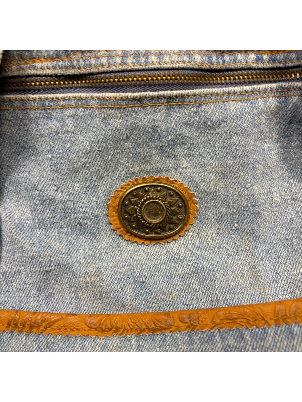 Vintage denim duffel bag, stains throughout but no distressing